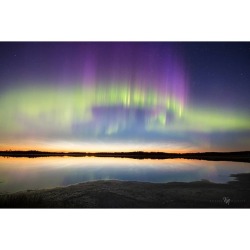 Northern Lights and Noctilucent Clouds   Image Credit &amp; Copyright: Adrien Mauduit  Explanation: Skies after the near-solstice sunset on June 17 are reflected in this calm lake. The tranquil twilight scene was captured near Bashaw, Alberta, Canada,