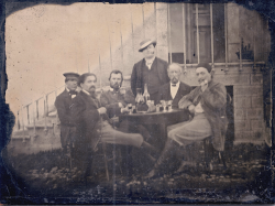 ginormouspotato:  photojojo:  It looks like any other old photograph you might find at an estate sale, but the gentleman highlighted in the 2nd image is someone who’s never been seen in photographic form: Vincent Van Gogh! A pair of collectors found