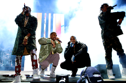 celebritiesofcolor: 2 Chainz, Fetty Wap, Kanye West and Travis Scott perform during ROC NATION SPORTS: Rn. 1st Annual Roc City Classic starring Kevin Durant x Kanye West on February 12, 2015 in New York City. 