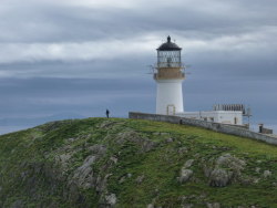 missedinhistory:  The Flannan Isles lighthouse on Eilean Mór in Scotland’s Outer Hebrides, site of the unsolved disappearance of three lighthouse-keepers in 1900.  (Photos &copy; Chris Downer, JJM and Peter Standing, and licensed for reuse under this