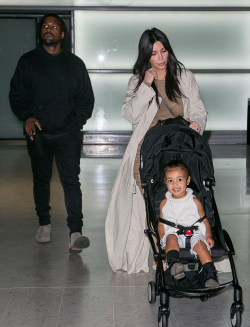 linglingsmisadventures:  kimkardashianfashionstyle:    April 13, 2015 - Kim Kardashian, Kanye &amp; North West arriving in Paris.     This baby is going to kill me.