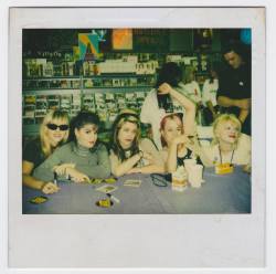 auraofhorror-deactivated2020083:  Polaroid of L7 with Courtney Love showing support- during an L7 record signing at Tower Records benefiting AIDS relief, 1993. 