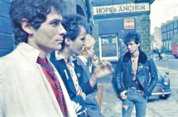 theunderestimator-2:  General Johnny Thunders inspecting his army of Heartbreakers (Walter Lure, Billy Rath, Jerry Nolan) in London, 1977, as documented by Leee Black Childers. One of the few punk bands who could sing about the street-gang lifestyle with