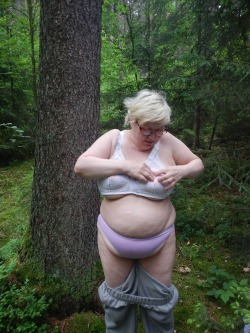 This chubby old granny is undressing in the woods much to our delight. What a big soft belly and cellulite legs she has.Find Senior Sex Partners Here