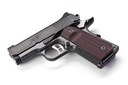 gunsknivesgear:  Kimber Tactical Ultra by Jeff Lynch 1.5 pounds of .45 caliber goodness.  Imagining this lovely pistol nestling against the small of my wife’s back gives me a little tingle…