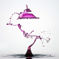 fuckyeahfluiddynamics:  Water droplet art celebrates the infinite forms created from the impact of drops with a pool and rebounding jets. It’s a still life captured from split second interactions between inertia, momentum, and surface tension. These
