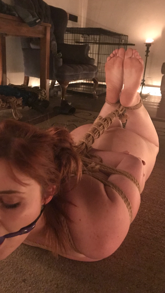 keepherhogtied:defununct:This is beautiful. She looks utterly at peace so helplessly bound. The ropework, her lovely hair, those cute freckles on her shoulder, her gag. This is how I want to tie a girl. Exactly like this. It’s a thing of beauty and