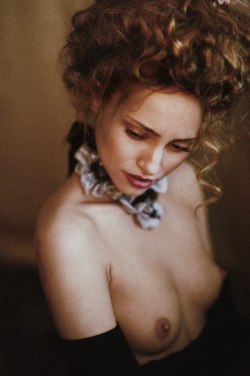 one of our favorites:Tatyana Putyatina aka ©Satin Popalambest of erotic photography:www.radical-lingerie.com