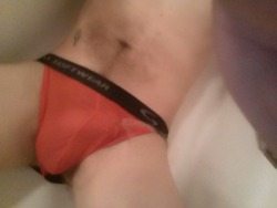 tattootodd80:  Pissing in a red mesh jock  sexy!