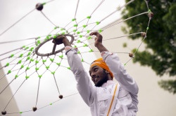 paxmachina:  An Indian Sikh pilgrim parades on April 13 in Bobigny, near Paris, during celebrations for Vaisakhi, the Sikh New Year Festival, which also commemmorates the founding of the Khalsa (Sikh community) by the tenth Guru (Guru Gobind Singh) in