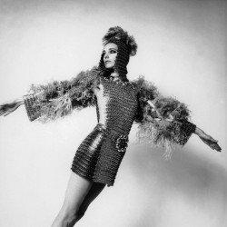 Ensemble created by Paco Rabanne for his spring-summer 1969 collection.  Complete with ostrich feathers and metal sequins this coat of mail dress is a must have for the space-bound!