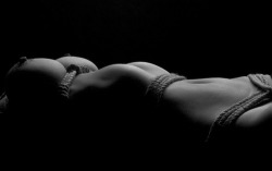 The sensuousness of rope and bare skin is unlike any other. Every nerve is heightened. I can feel the cool slide of the rope and the pressing of the knots against my breasts and clit.