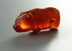 strongbadgmail: museum-of-artifacts:  Amber bear amulet of neolithic hunter. c. 3500 years old  I will NEVER not reblog the 3500 year old gummy bear 