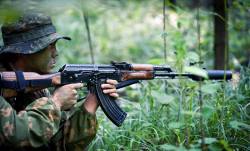 opdownrange:  Russian Spetsnaz member holding suppressed Kalashnikov in the woods. 