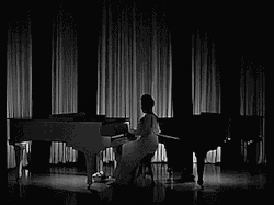 classicladiesofcolor:  The incomparable Hazel Scott playing two grand pianos in The Heat’s On (1943) [x] 