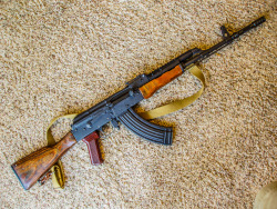 thatonegunblog:  WASR With Yugoslavian Grenade LauncherUses blanks to launch all standard NATO 22mm rifle grenades.(NOTE: Because the AK platform rifle lacks a gas cut-off, when firing grenades some of the gasses will be diverted and the rifle will