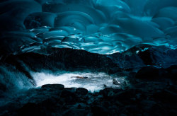 discoverynews:  Inside an Alaskan Ice CaveThe Mendenhall Glacier near Juneau, Alaska, is a 12-mile long sheet of ice where visitors can walk across the top of the glacier. The more adventurous can hike four miles to the ice’s edge, where melt water