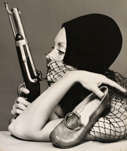 Bruno Benini - Sandi Mitchell with Gun, Melbourne, Australia, 1970.