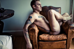ADAM KLESH  (nude in leather chair) -photographed by landis smithers