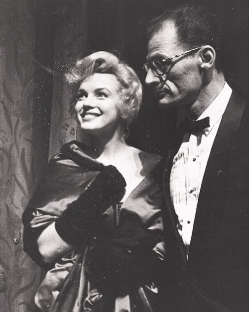 perfectlymarilynmonroe:  Marilyn Monroe and Arthur Miller photographed at the opening of his play, A View from the Bridge which premiered on October 11th, 1956 in London, England.The New York Daily News headlined their report with “Marilyn Steals Show