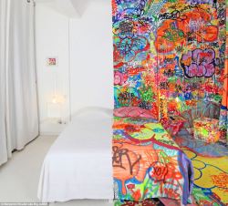 sixpenceee:  Half of a Marseille hotel room has been swamped in decoration by French graffiti artist Tilt, while the other half stays purely white. 