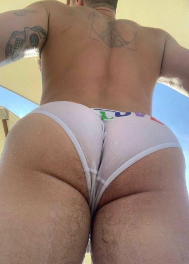 orbtricity:You were at the beach with some friends from school. You were laying in the sand, tanning, when a man caught your eye. The muscled, tattooed behemoth was walking down the beach, his tight white speedo riding into his deep bubble butt. As he