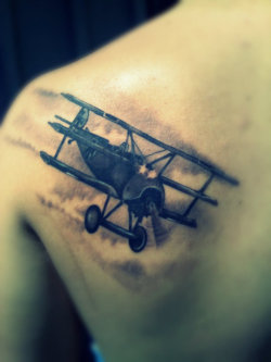 fuckyeahtattoos:  The Red Baron is a distant relative of mine.   Done by Angel at Fat Cat in Fair Oaks, CA  www.fuckkarma.tumblr.com (Photo by www.calmdownhun.tumblr.com)