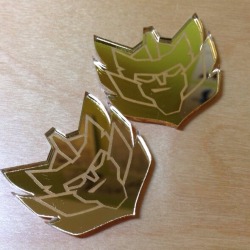 sowiddlefur:  So these arrived today! I got some laser cut acrylic charms to make into keychains &amp; badges. These are for Tfcon Chicago to help fill in for the fact I won’t be able to bring any mugs. I hope everyone likes them as much as I do! 