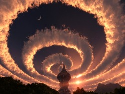  Cloud spiral in the sky. An Iridescent (Rainbow)