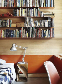 myidealhome:  wood wall with stunning bookshelves (via photo Casey Dunn - Design Milk) 