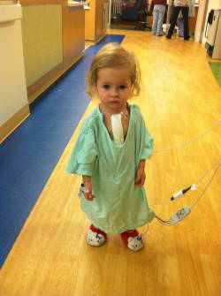 tattoodevil:   This beautiful little girl had open heart surgery less than 24 hours before this photo was taken. When asked why she was up so quickly, she replied her Hello Kitty slippers make everything better.   That little girl is fucking adorable.