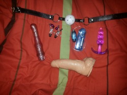 alittlenymph:  my toys.  gag ball (gift from Rofabio)bullet vibe (gift from Rofabio)nipple clamps (gift from Rofabio)butt plug (gift from Rofabio)dildo (gift from an old stranger)sparkles vibe dildo  (i bought it)  i dont have many toys, but i’m