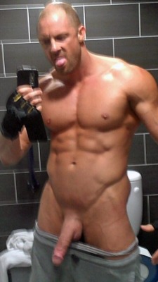massivemusclebears:  After this Alpha took this picture in the gym, he was so fucking horned up, that he grabbed me, (we had never met before), pulled me into a shower stall and proceeded to fuck the living hell out of me, breeding my ass.  Afterward,