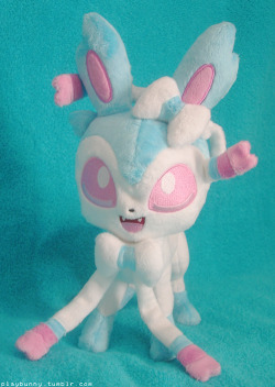 I am legit screaming everywhere right now !! Look at what I got today !! This is a shiny Sylveon plush I commissioned the lovely spacevoyager for of my in game, shiny female Sylveon, Charlie.  She&rsquo;s absolutely perfect and stands up well on her