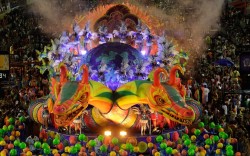 1,000 things to see before you die (the Unidos de Vila Isabel samba school performs on their float during the second night of carnival parades at the Sambadrome in Rio de Janeiro, Brazil)