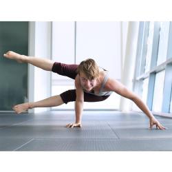 yogogirls:  This little firecracker is Christine Kick -asana. She’s an acro master and a wonderfully energetic yoga instructor. We adore her!   (at Yoga Six St. Louis) 