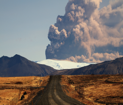 awkwardsituationist:  photos by sverrir thorolfsson of the 2010 eruptions of eyjafjallajökull and the fallout from the four and half kilometre high plume that settled on the greenery around skogafoss waterfall. (more iceland and volcano posts)