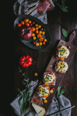 gastronomicgoodies:Eggs Benedict with Manchego, Tomatoes, Prosciutto and a Sage Hollandaise Sauce
