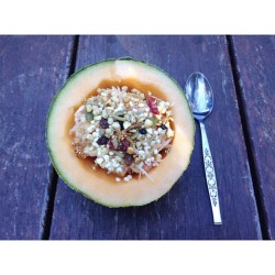 Summer is nearing ☺ happy weekend! {banana, shredded apples, puffed millet and muesli in a cantaloupe bowl} 