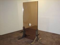 kingdom-visions:  I know what you want (glory hole)Benjy Russell. 2009. bullet-proof glass, two-way mirror, anti-surveillance film, wood, steel. 