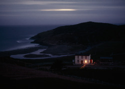 natgeofound:  A solitary fisherman’s home keeps watch on quiet Placentia Bay in Newfoundland, Canada, 1974.Photograph by Sam Abell, National Geographic Creative 