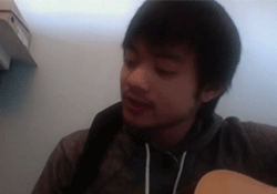 in-the-truly-grusome-do-we-trus:  Osric Chau attempting and failing somwhere in the middle to play / sing the adventure time theme 