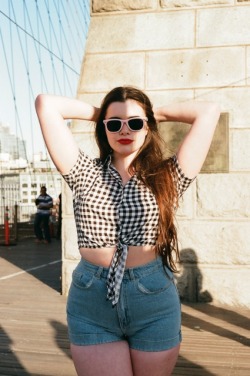 americanapparel:  Barbara and Diana wear the New V Strap Tank, New Plaid Circle Skirt, New Tie Up Blouse and High Waist Jean Cuff Shorts. 