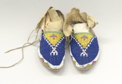 blondebrainpower:Oglala, Lakota, Sioux (Native American. Pair of Beaded Moccasins, late 19th-early 20th century. Buckskin, rawhide, beads, a: 9 x 3 ½ x 4 (23.0 x 9.0 cm).Brooklyn Museum, Robert B. Woodward Memorial Fund,  26.805a-b. Creative Commons