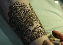 gn-a:  Mehndi (or henna painting) in India is a very important part of the wedding ritual and ceremony. As the story goes, the deeper the color obtained on the skin, the longer the love between the couple will last; hence the belief that a proper mehndi