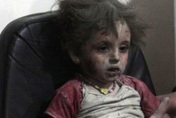 themarchtragedy:  linrenzo:  dimens1ons:  Baby girl in shock after surviving one of five air strikes dropped by forces loyal to Bashar Al Assasd in eastern al Ghouta Syria September 11,2014.  My god  this is reality. not for you, not for me, not for us