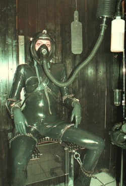 Rubber lady with a nice gasmask.