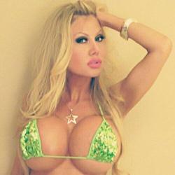 Very hot blonde slut with perfect fake tits wearing a sparkly green bikini!  Follow Fake Tits Club on Tumblr  Fake Tits Club is full of free porn pics and GIFs of stunning, hot and sexy babes with perfect fake tits. All the  girls on this sexy tumblr