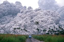 A pickup truck flees from the pyroclastic