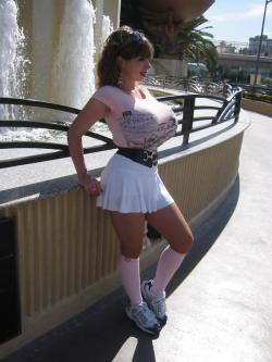 biggestboobguns:  A skirt that short can only mean one thing.  She’s waiting for some to come along and hoist her up on that ledge and fuck her right there.